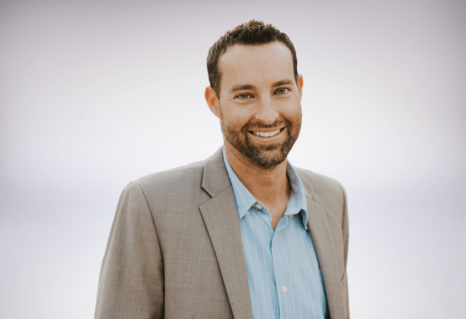 vp of sales and marketing at busybusy wearing a suit